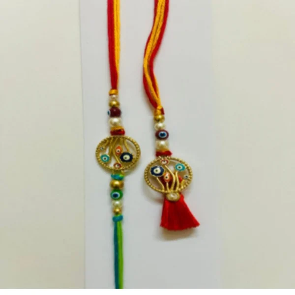 Sparkling Thread Jewel – Designer Couple Rakhi Gift Set in Elegant Shades for Brother & Bhabhi