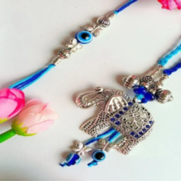 Threaded Embrace Combo – Designer Couple Rakhi Gift Set in Multi Shades for Brother & Bhabhi