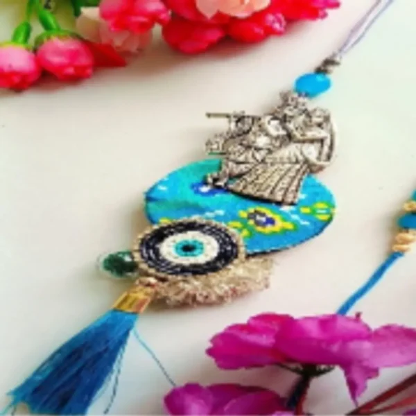 Blue Graceful Duo – Designer Couple Rakhi Gift Set in Blue Shades for Brother & Bhabhi