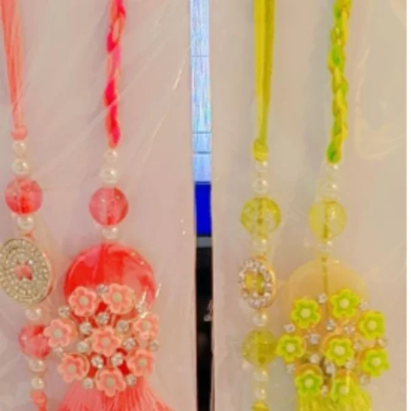 Elegant Ethnic Set– Designer Couple Rakhi Gift Set in Soothing Green Shades for Bhaiya & Bhabhi"