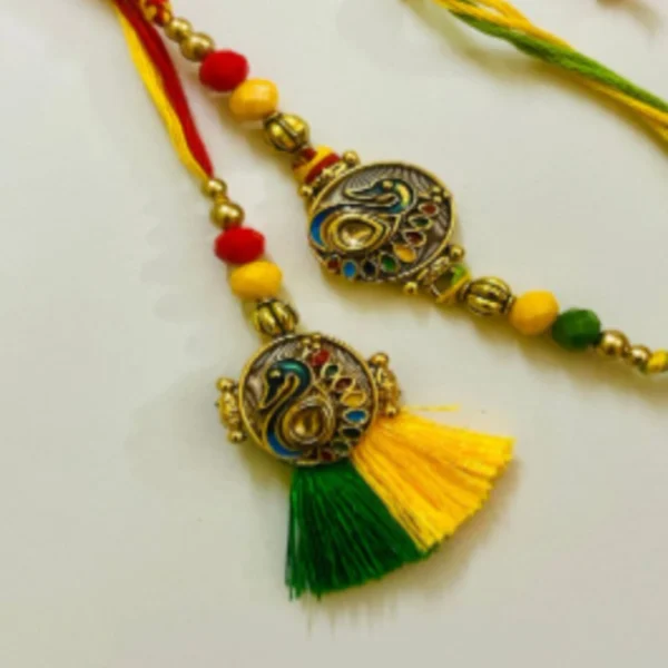 Royal Zari Rakhi Set – Designer Couple Rakhi Gift Set in Elegant Shades for Brother & Bhabhi